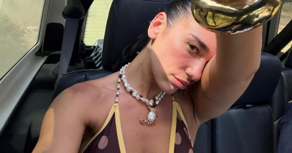 Dua Lipa's Skimpy with Jean Polka Dot Bikini Top Hang on for Dear Life